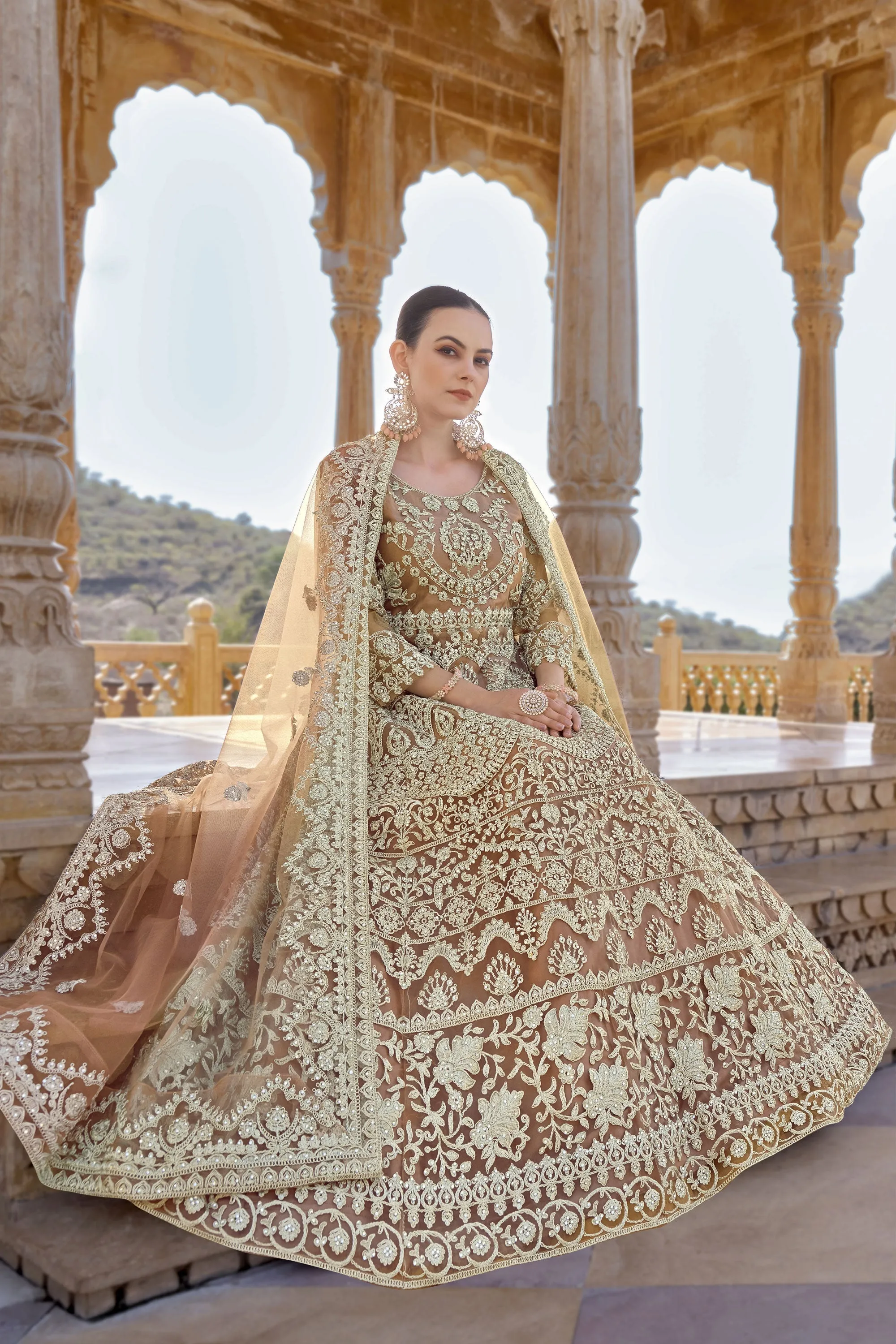 Trendy Net Fabric Peach Color Anarkali Suit With Embroidered Work