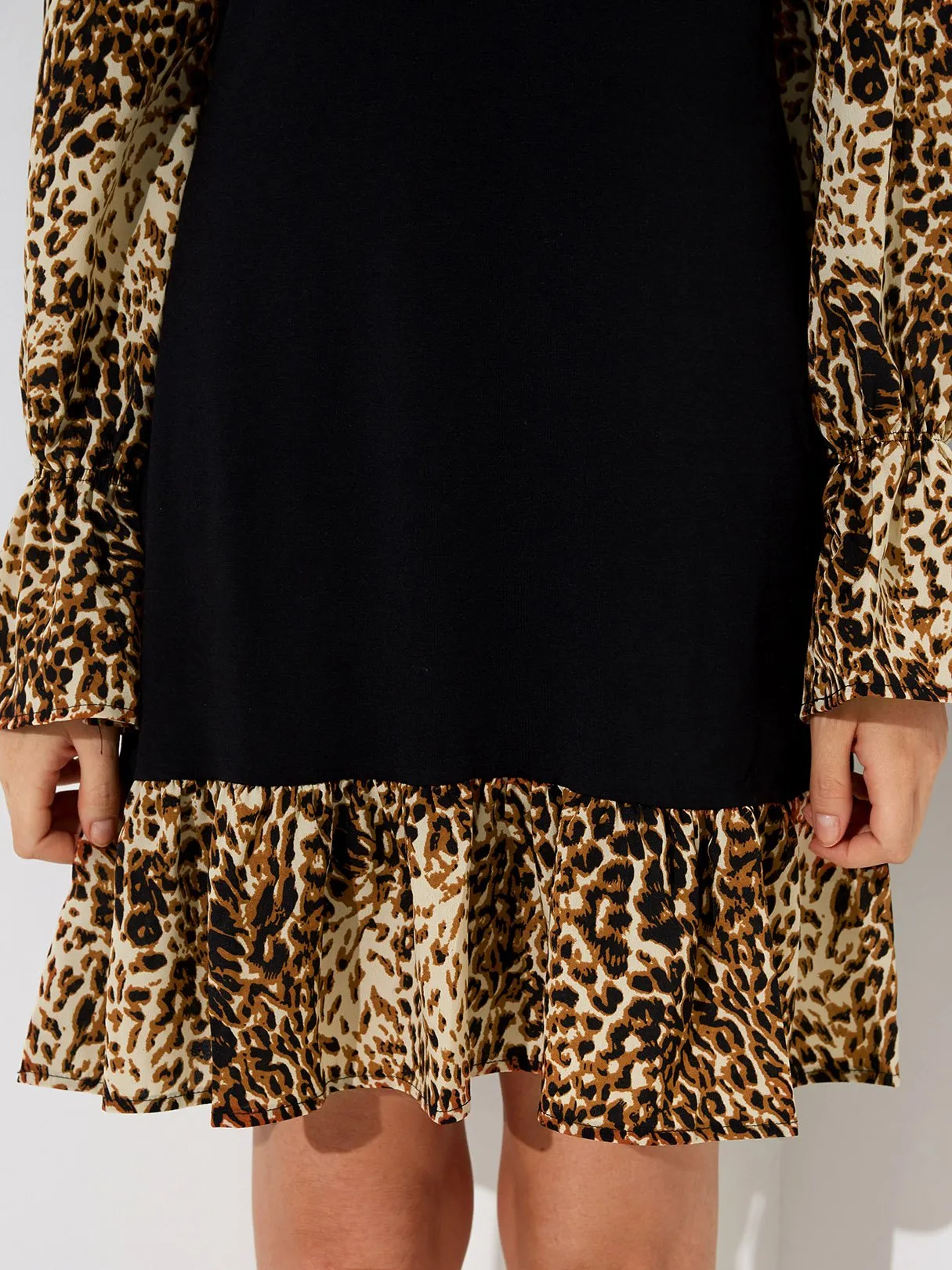 Wholesale Black Round Neck Long Sleeve Leopard Ruffle Hem Sexy Dress